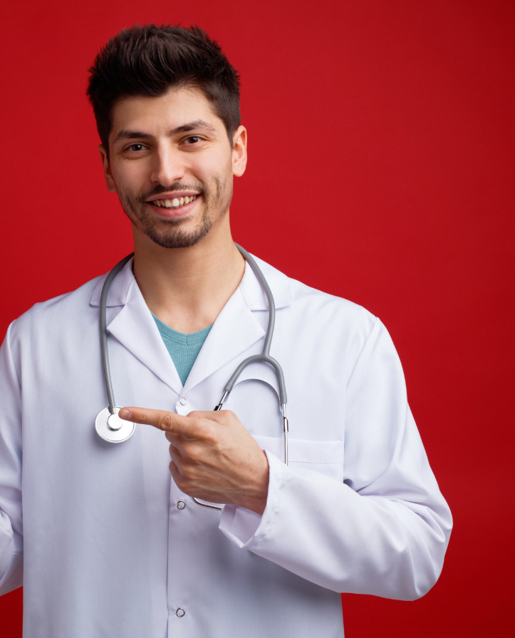 smiling young male doctor wearing medical uniform and stethoscope around his neck looking at camera showing mobile phone to camera pointing at it isolated on red background - رؤية - رؤية